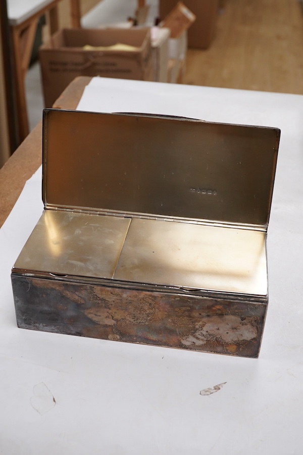 A Victorian silver rectangular cigarette box, by George Unite, with two interior lidded cedar wood lined compartments and engraved WS monogram, London, 1885, 17.9cm. Provenance - formerly the property of Walter Shoolbred